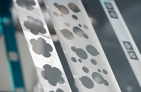 Precise & Environmentally Friendly Labeling Solutions by LEONHARD KURZ Cold transfer foil with flower & round cut-outs